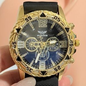 Gold and Black Chronograph Watch.